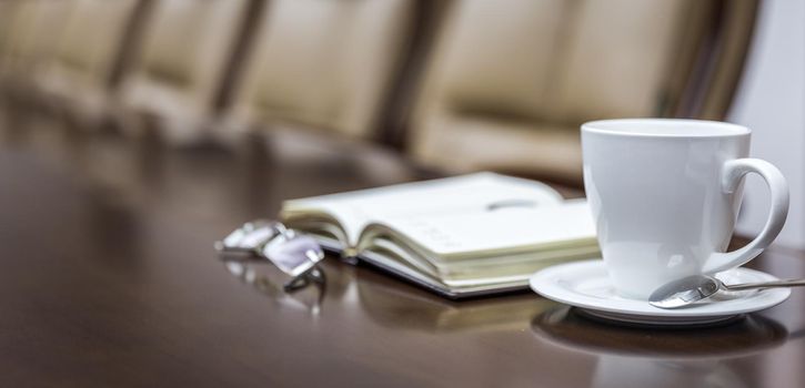 Business papers in conference room before meeting in office