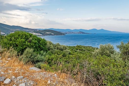 kusadasi,aydin,turkey- july 24,2021.seascape, green nature and sportive trekking paths in kusadasi in early morning time and summer season.