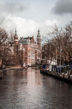 AMSTERDAM, NETHERLANDS - MARCH 15: Streets of the city with canals, on March 15, 2014 in Amsterdam