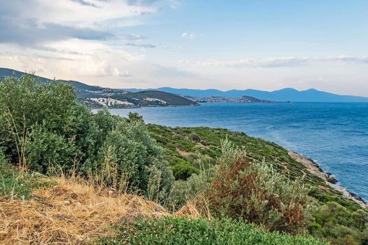 kusadasi,aydin,turkey- july 24,2021.seascape, green nature and sportive trekking paths in kusadasi in early morning time and summer season.