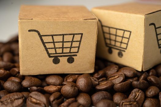 Box with shopping cart logo symbol on coffee beans, Import Export Shopping online or eCommerce delivery service store product shipping, trade, supplier concept.