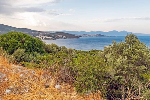 kusadasi,aydin,turkey- july 24,2021.seascape, green nature and sportive trekking paths in kusadasi in early morning time and summer season.