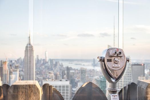 New york, USA - May 17, 2019: Binoculars looking at landmarks in midtown Manhattan, New York City, USA