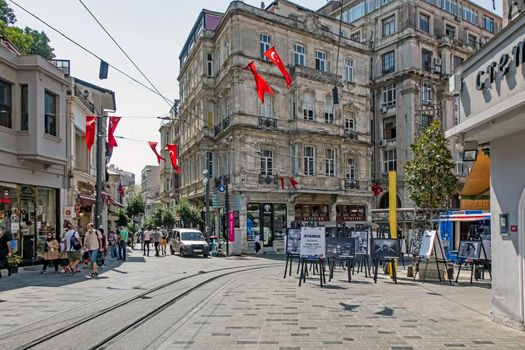 istanbul,turkey-august 28,2021.Street view from Istiklal Street with its historical and modern buildings in summer season with tourists and visitors in istanbul.