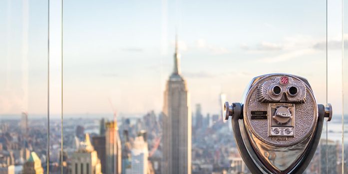 New york, USA - May 17, 2019: Binoculars looking at landmarks in midtown Manhattan, New York City, USA