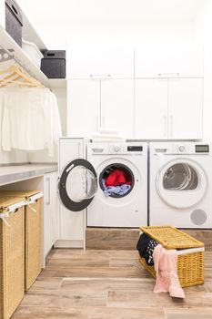 Laundry room with basket and dirty clothes
