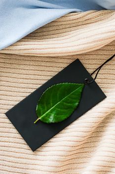 Blank black price tag for eco fashion brand.