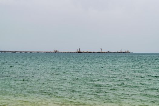 View of an oil pipeline and a dock for oil tankers.