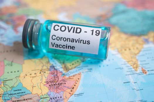 Bangkok, Thailand - July 1, 2021, Coronavirus Covid-19 vaccine on Africa map, development medical for doctor use to treat pneumonia illness patients.