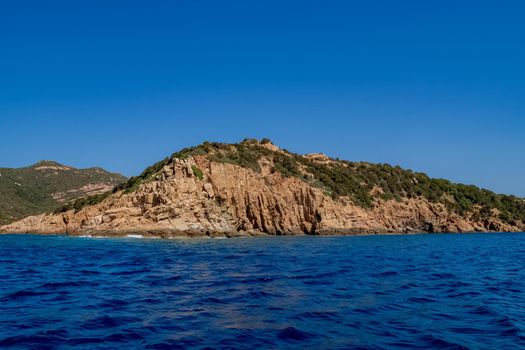 Beautiful view of the southern Sardinian sea from the boat. Note the particular rock formations.