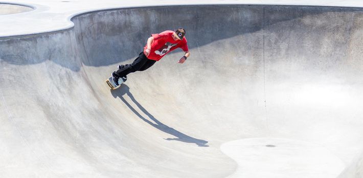 VENICE, UNITED STATES - MAY 21, 2015: Venice Beach, Skaters in Skatepark , California. Venice Beach is one of most popular beaches of LA County.