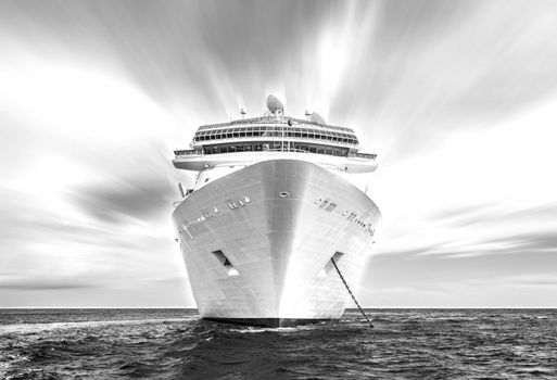 Cruise ship in ocean, black and white style