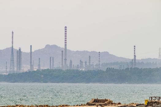 View of a refinery near the sea coast.