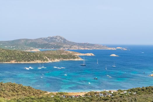 Panoramic view of the wonderful southern Sardinian coast, Teulada, Italy. Note the beautiful turquoise colors of the sea in contrast with the colors of the rocks and vegetation.