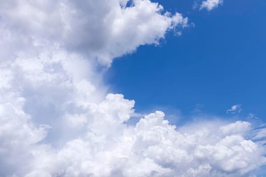 beautiful clouds on the blue sky as a background. High quality photo