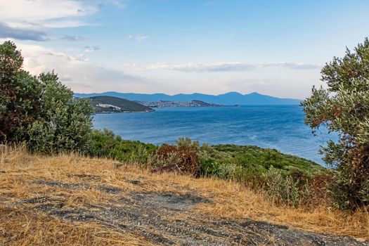 kusadasi,aydin,turkey- july 24,2021.seascape, green nature and sportive trekking paths in kusadasi in early morning time and summer season.