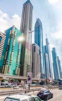 DUBAI, UAE- JANUARY 16: Modern skyscrapers, Sheikh zayed road, Dubai, United Arab Emirates on January 16, 2014. Dubai is the fastest growing city in the world.