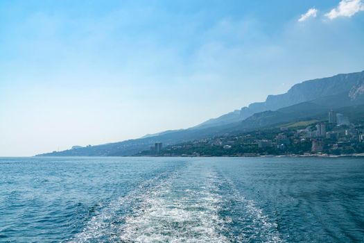 the trace of the ship's propeller on the water. High quality photo