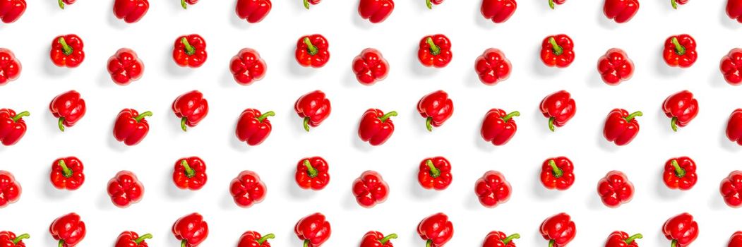 Bulgarian red ripe pepper on white backdrop. background from paprika, flat lay not seamless pattern