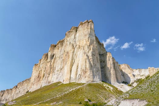 white chalk limestone rock against a blue sky aerial view. High quality photo