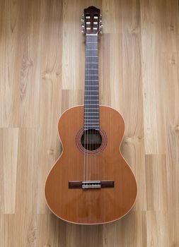 A classical guitar with six nylon strings