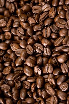 Brown coffee beans, closeup of coffee beans for background and texture