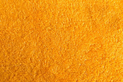 a bright shiny orange soft towel background