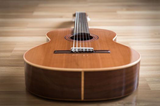 A classical guitar with six nylon strings