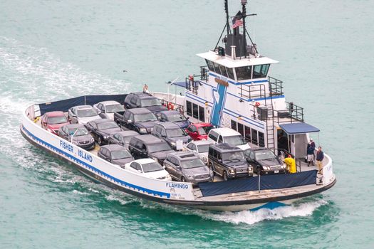 MIAMI, USA - DECEMBER 11, 2016 : Ferry transporting cars from Fisher Island in Miami