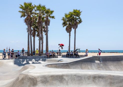 VENICE, UNITED STATES - MAY 21, 2015: Venice Beach, Skaters in Skatepark , California. Venice Beach is one of most popular beaches of LA County.