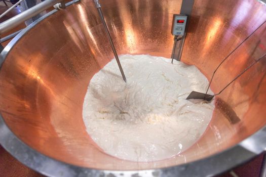 Parmesan cheese prduction in Italy