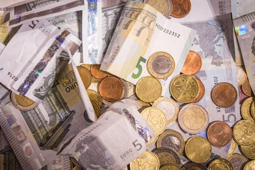 Euro money: closeup of banknotes and coins