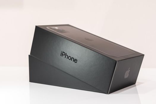 Moscow, Russia - September 24, 2019: Close up of black box of the Apple iPhone 11 pro, unboxing on a white background