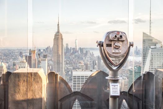 New york, USA - May 17, 2019: Binoculars looking at landmarks in midtown Manhattan, New York City, USA