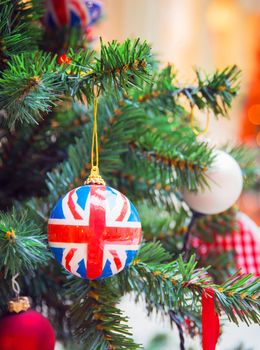 a Christmas tree decoration with british symbols