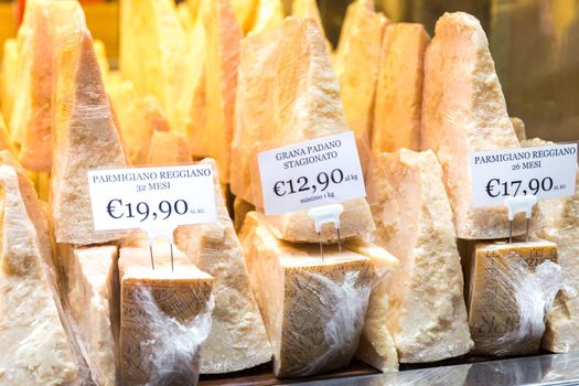 FLORENCE, ITALY 01 MAY, 2018: Italian parmesan Cheese for Sale in a Shop in Florence Italy