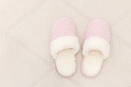 Woman house slipper on a floor carpete slippers
