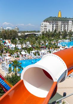 ANTALIA, TURKEY - MAY 11, 2014: Colorful waterpark tubes and a swimming pool in Delphin Imperial hotel on MAY 11, 2014 in Antalia.