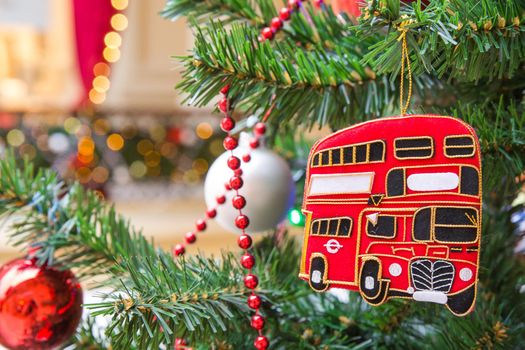 Christmas tree decoration with red double-decker London bus