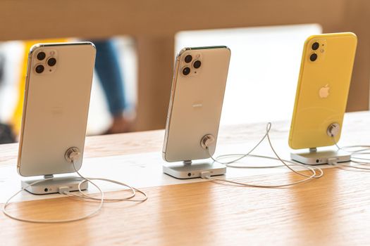 Aventura, Florida, USA - September 20, 2019: The iPhone 11, 11 Pro and Pro Max are displayed as the new smartphone by Apple goes on sale on the first day