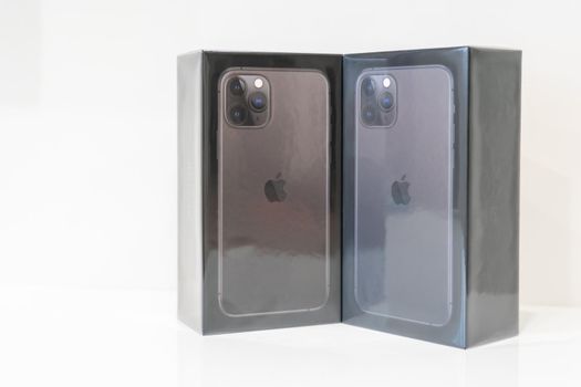 Moscow, Russia - September 24, 2019: New Apple iPhone 11 pro sealed in box over White Background