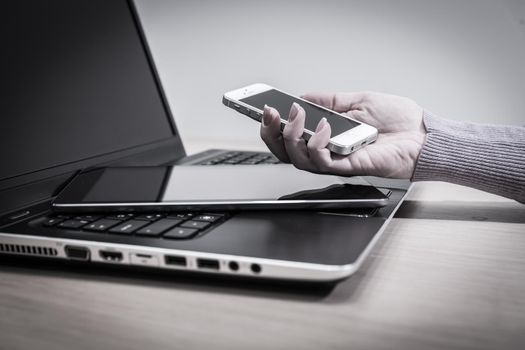 Modern electronic devices - laptop, tablet and telephone