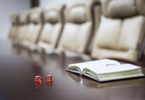 Closeup of on table in empty corporate conference room before business meeting in office