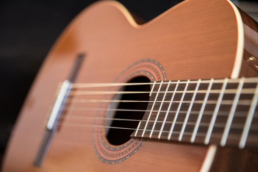 A classical guitar with six nylon strings
