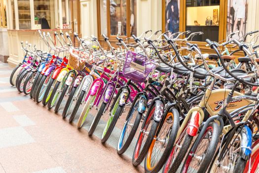 MOSCOW -NOVEMBER 21: Selling vintage bikes in GUM department store, November 21, 2013, Moscow, Russia.
