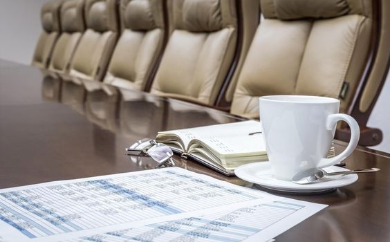 Business papers in conference room before meeting in office