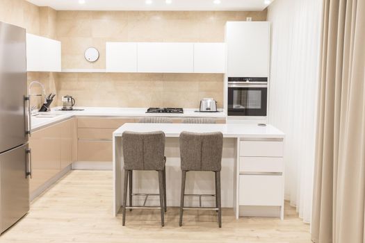 Modern kitchen interior in luxurious apartment