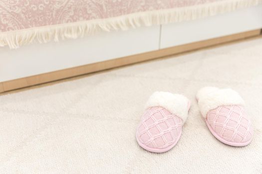 Pink cozy knitted slippers