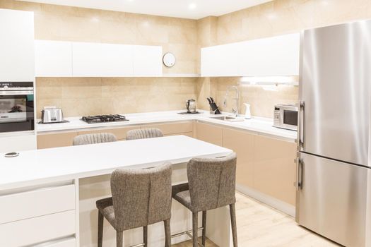 Modern kitchen interior in luxurious apartment