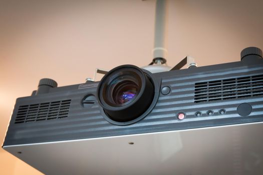 computer projector hanging in a conference hall